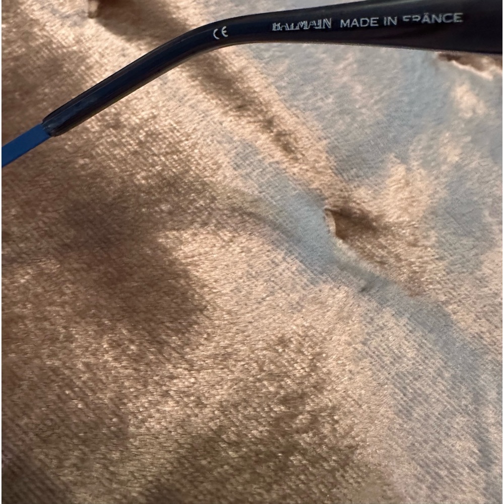 Sharp blue sunglasses in excellent condition come with original box and cloth